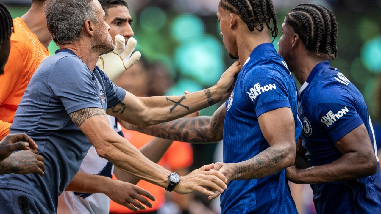 Photos capture Luis Enrique's push on Chelsea's Joao Pedro as PSG coach faces nervous wait ahead of potential FIFA sanctions