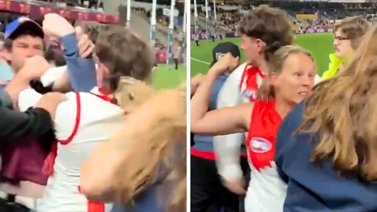 Crowd fight erupts in wild scenes following Swans and Lions clash as police launch investigation