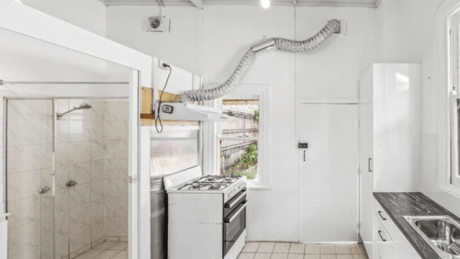 'Has to be a joke': $1350-per-week Inner West rental with bathroom INSIDE the kitchen exposes grim reality of Sydney housing market