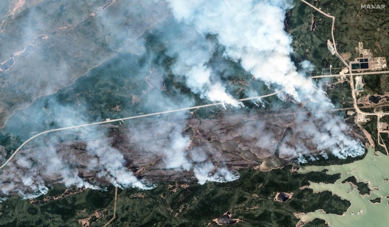 Military aids evacuations as Canada wildfires expand eastward