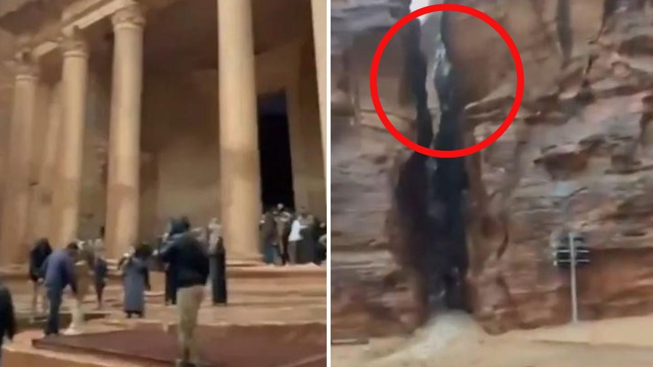 Mum and son found dead after flash flooding in tourist hotspot as hundreds are evacuated