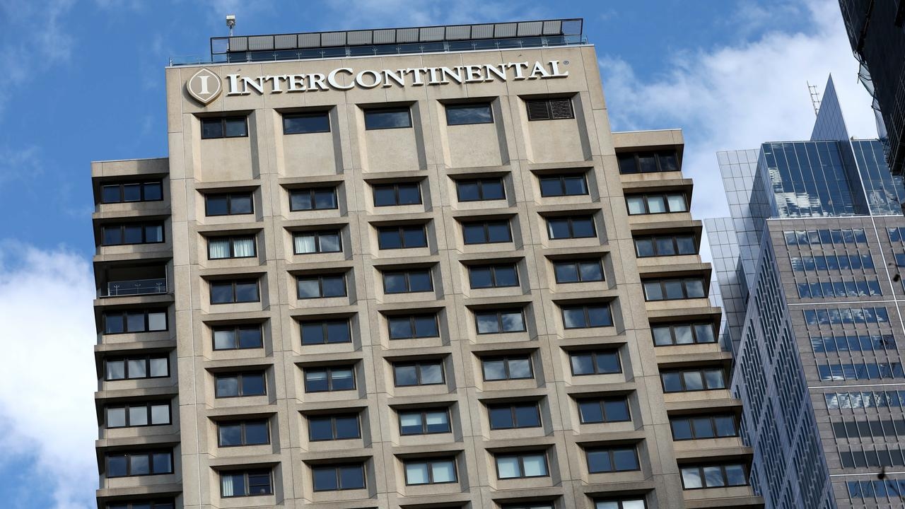 Two injured, woman charged after alleged stabbing at InterContinental Sydney