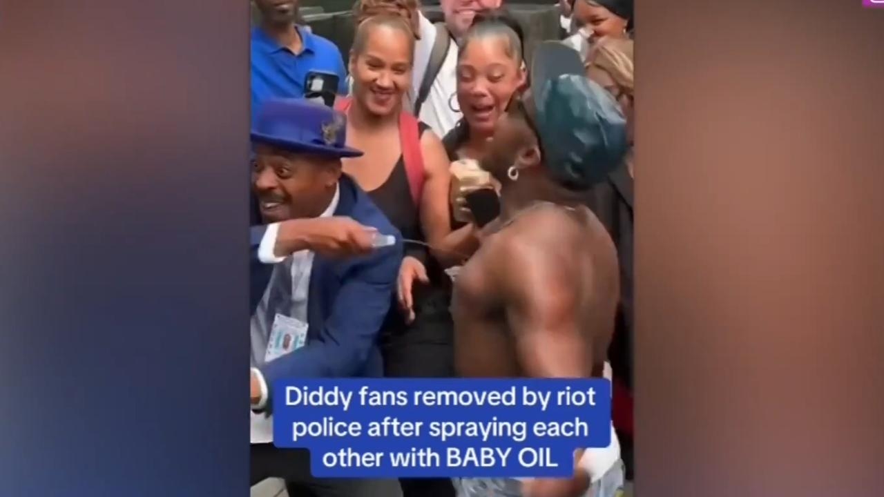 Diddy supporters celebrate trial verdict by spraying themselves with baby oil