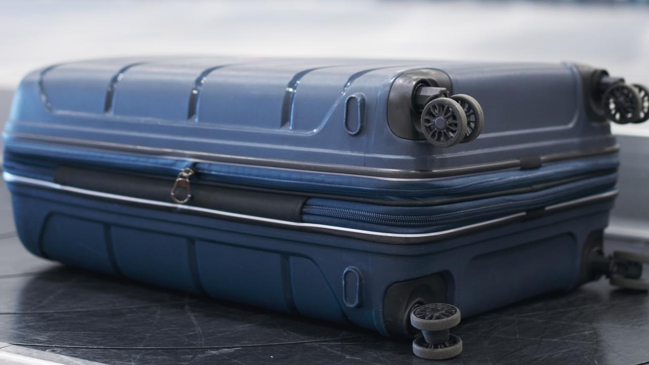 New Zealand woman arrested after travelling with 20yo child in suitcase