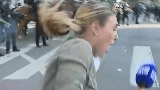 Australian journalist caught in crossfire as LA protests turn violent over Trump immigration raids