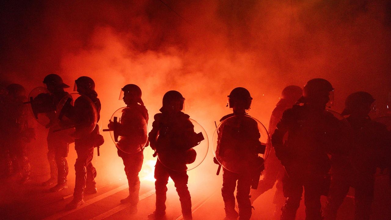 Melbourne streets turned red as A-League's fans set flares, taunt police
