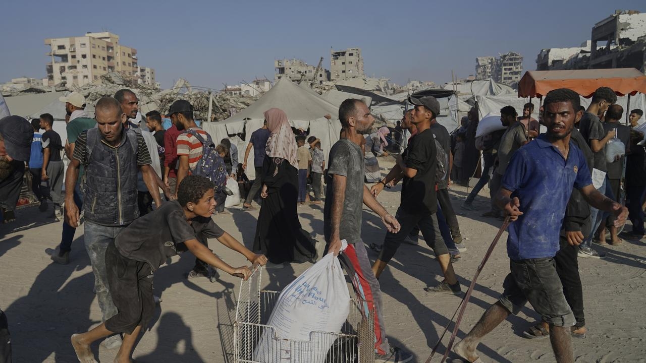 Israel drops aid packages into Gaza, to open humanitarian corridors