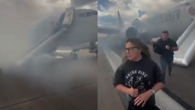 American Airlines flight engulfed in ‘a lot of smoke, fire', forcing panicked passengers to flee via emergency slide, harrowing video shows