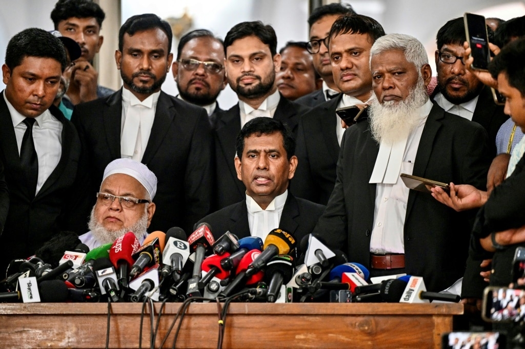 Bangladesh opens fugitive ex-PM's trial over protest killings