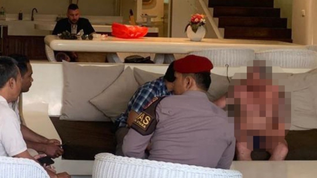 Aussie man arrested after morning of chaos on Bali streets from alleged carjacking, crashing into two people and lighting vehicle on fire