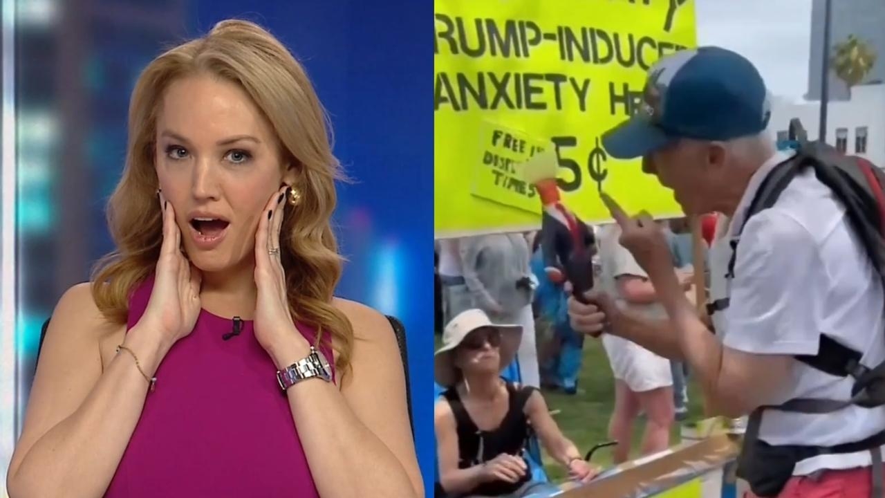 Deranged protester loses it at Donald Trump doll