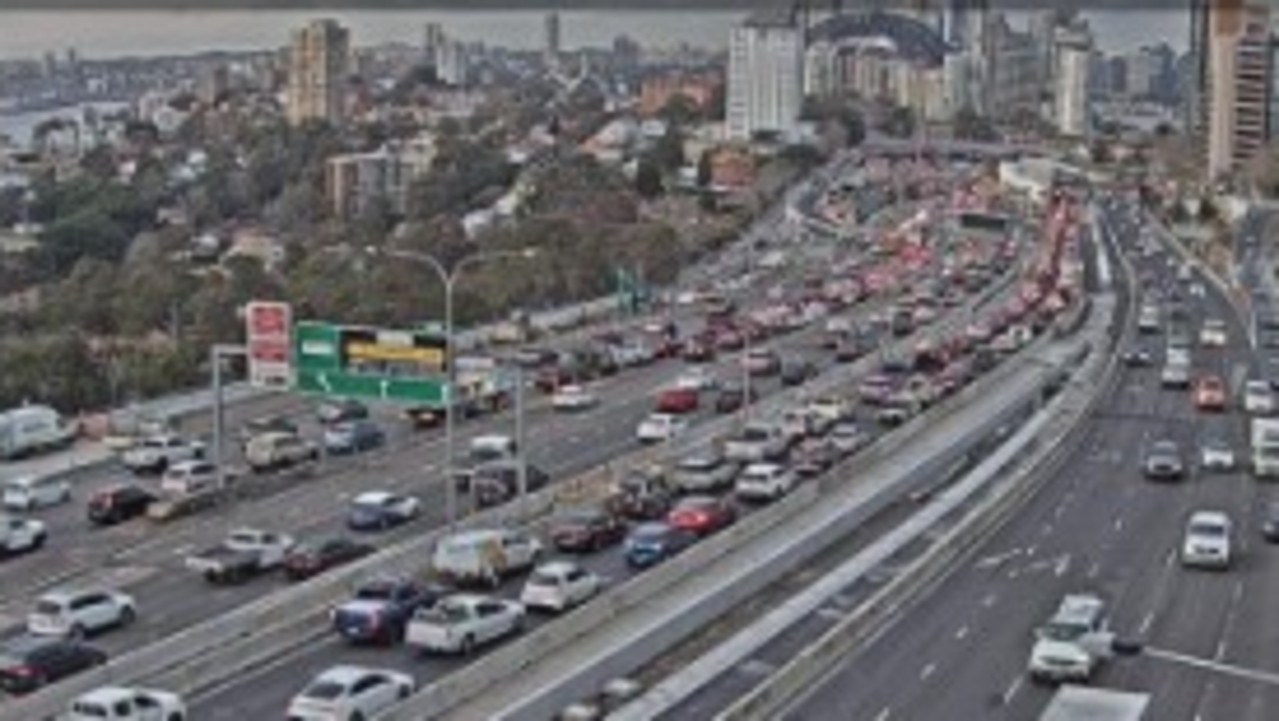 Traffic chaos after car, motorcycle crash near Sydney Harbour Bridge