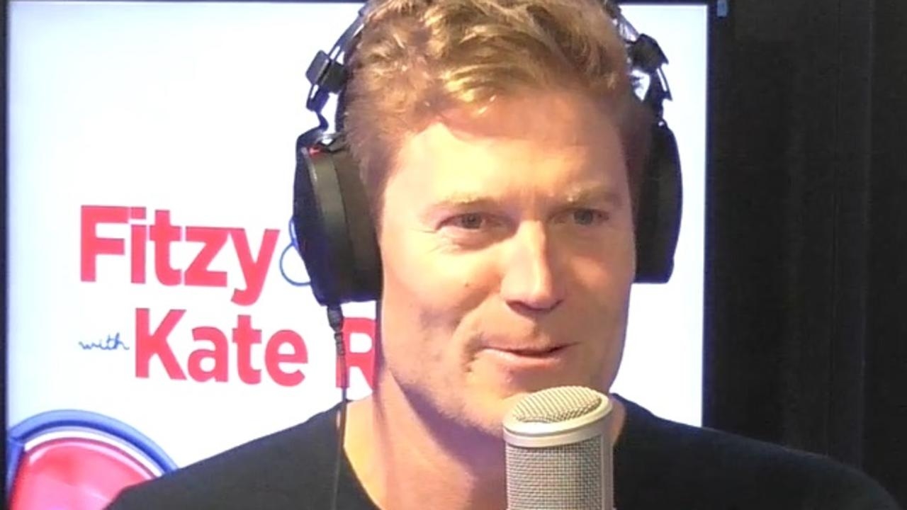 Squirming Dr Chris Brown grilled about new ‘love' on-air