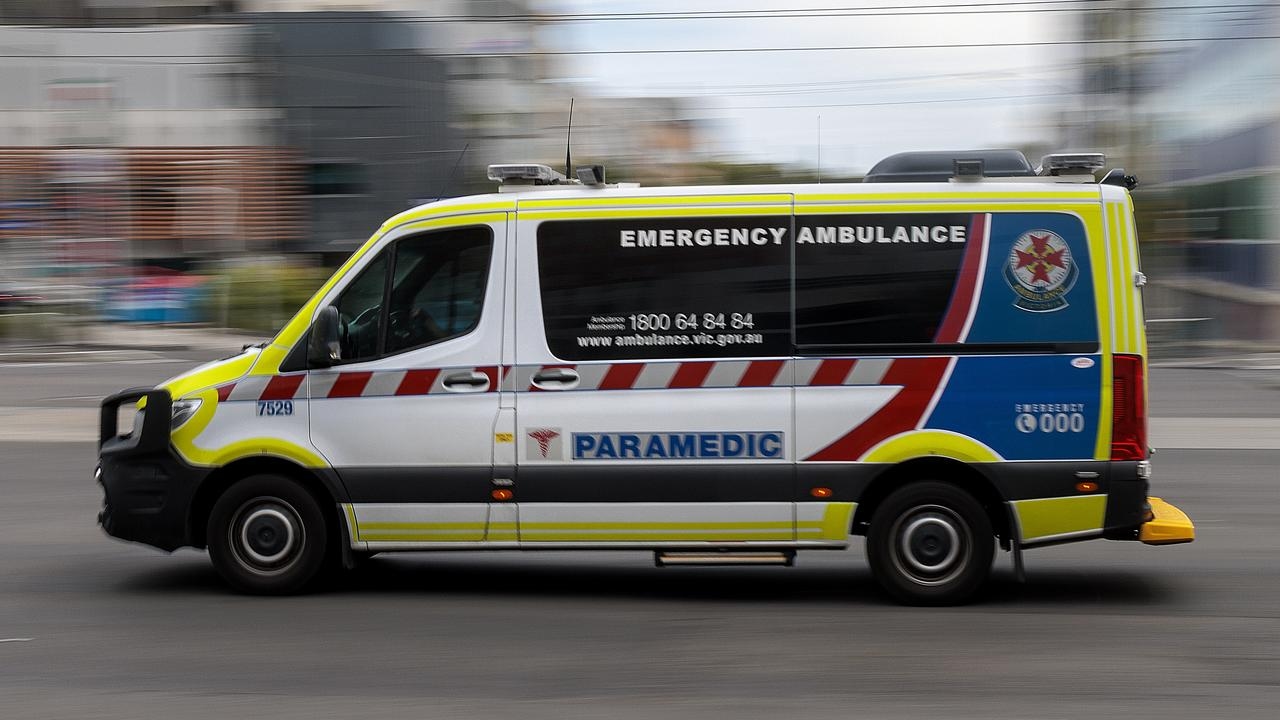 Three arrested after man stabbed in head during Kew East home invasion, children asleep inside