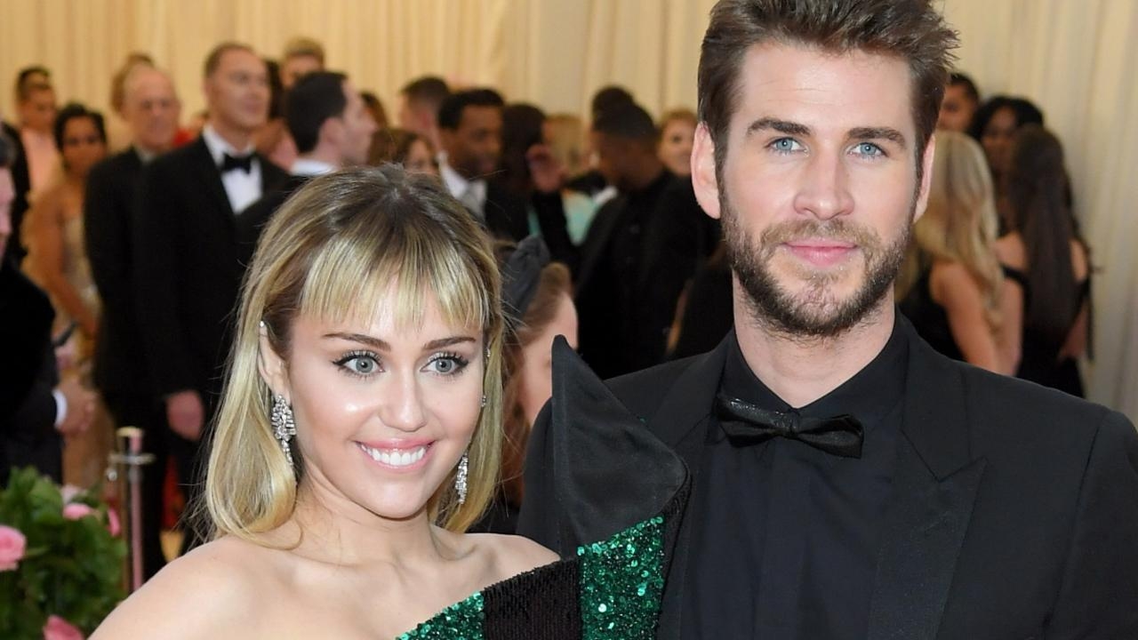 Miley Cyrus jokes about ex-husband Liam Hemsworth ‘catching strays' after savage dig