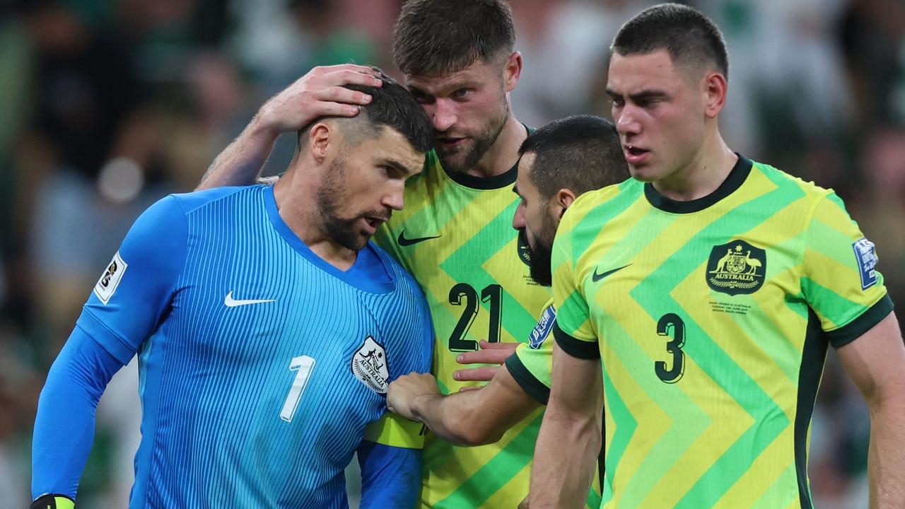 Mat Ryan saves penalty in fitting way to help Australia qualify for World Cup in his 100th game for the Socceroos