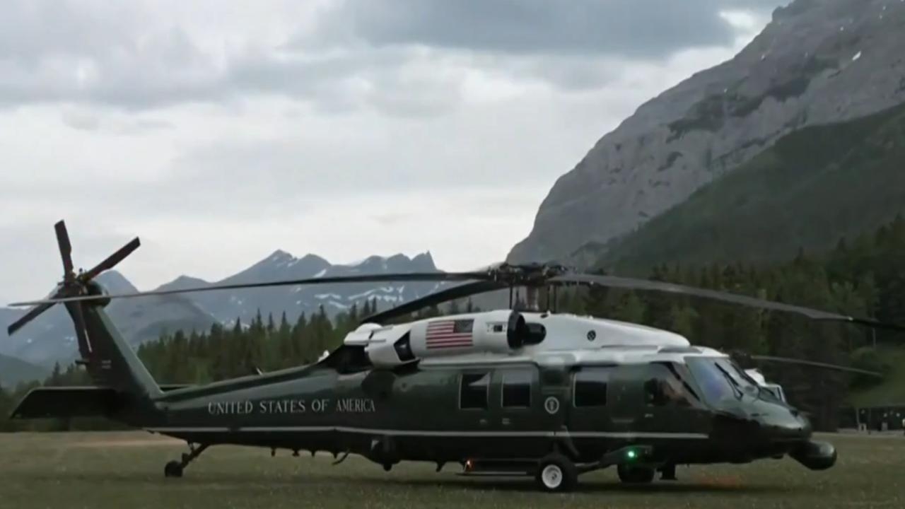 Donald Trump departs the G7 summit