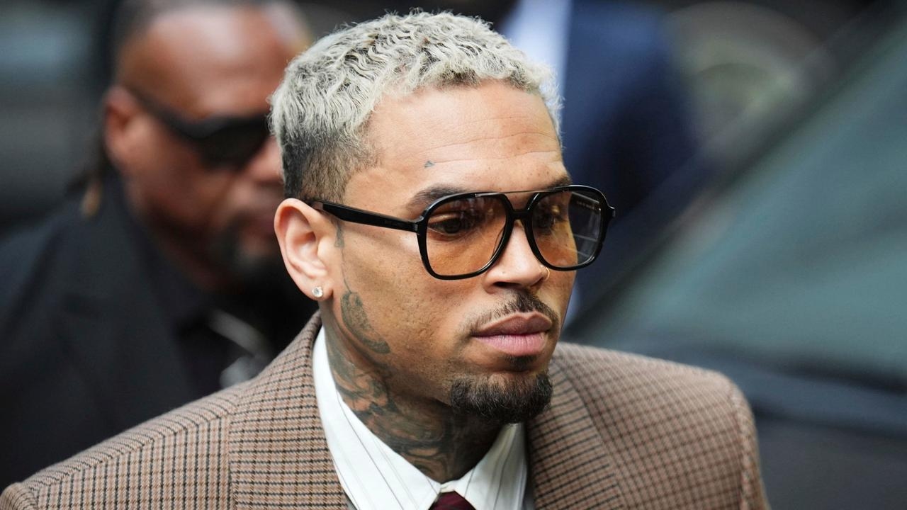 Chris Brown arrives at court over club ‘attack' after ‘hitting producer several times with bottle'