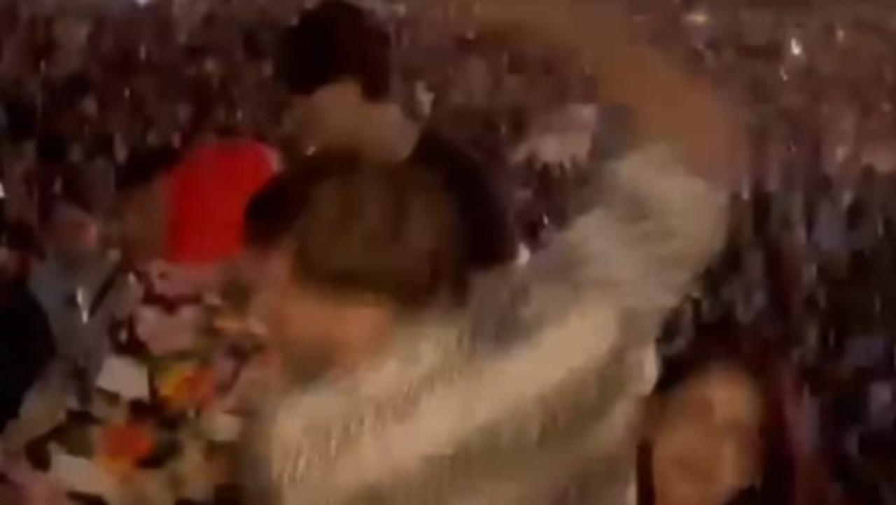 Woman allegedly beaten unconscious at Australian band's concert in California