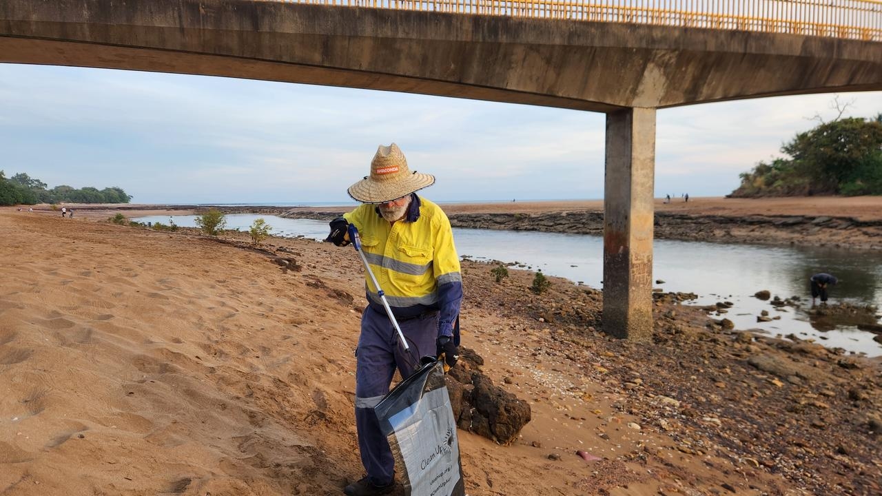 Volunteers clean up the cracker day mess