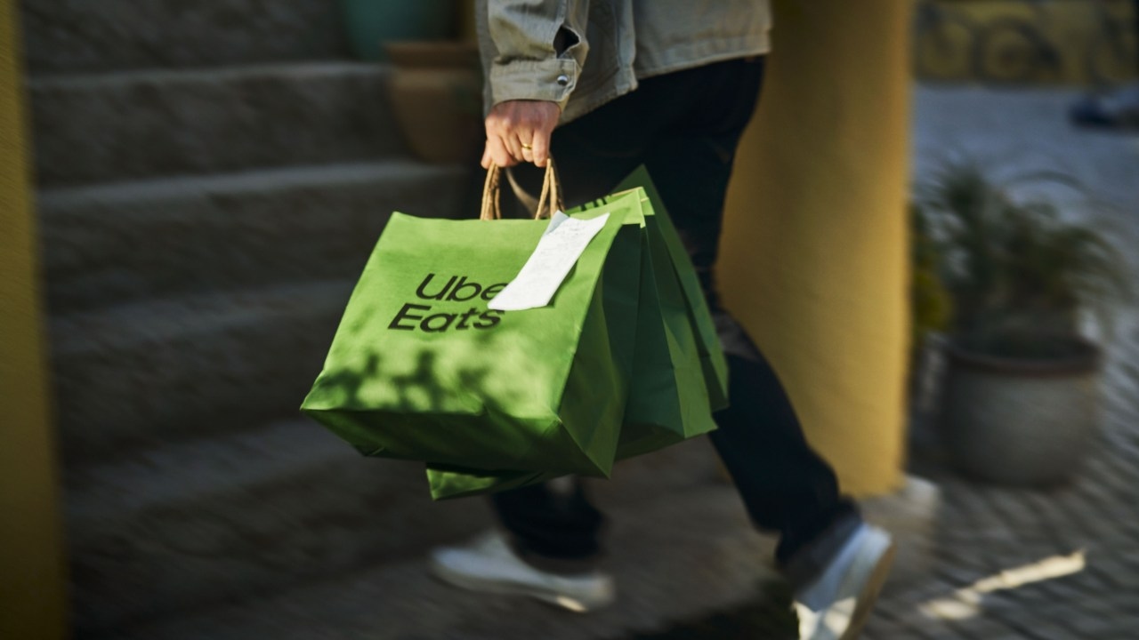Uber and Uber Eats partner with Afterpay as younger Aussies abandon credit cards