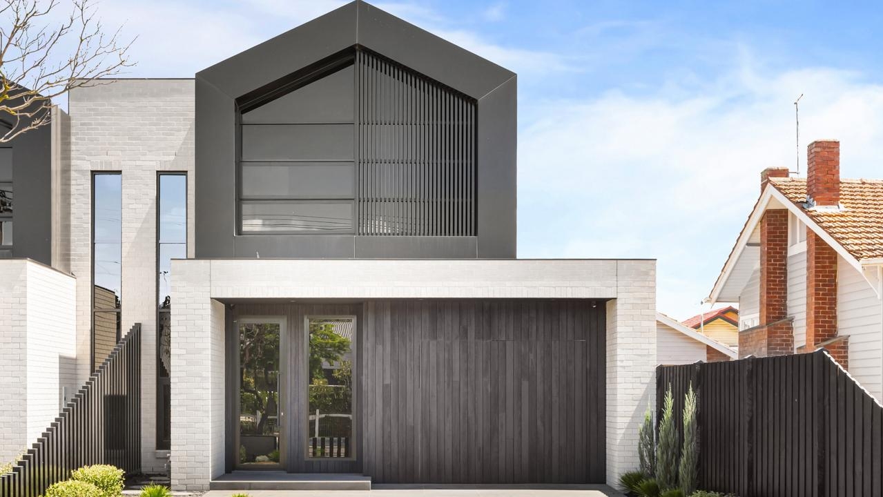 Luxury Reservoir home gives off resort vibes with floating staircase, handpainted mural