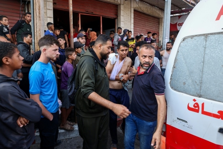 Gaza rescuers say Israeli fire kills 10 near aid site as ceasefire push stalls