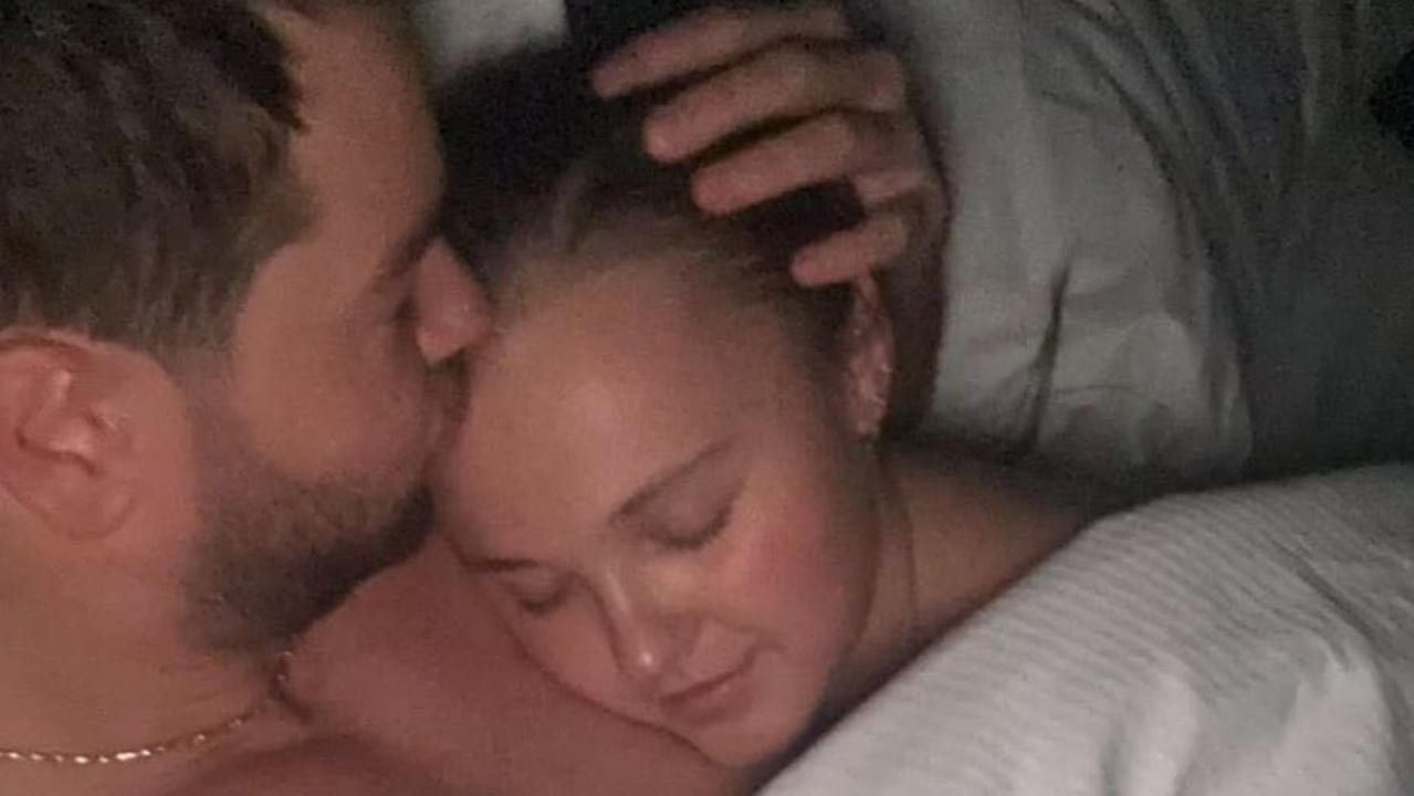 Chris Hughes shares intimate photo of himself and ‘sleeping beauty' JoJo Siwa cuddling in bed