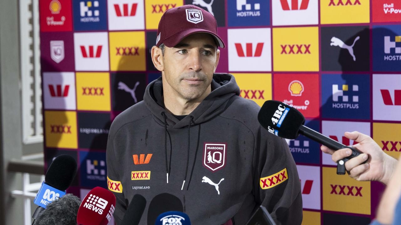 Aaron Woods can't help himself from sticking boot into Billy Slater