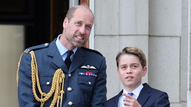 'He will make an excellent King one day': Prince George's adorable gesture towards Prince William during balcony appearance delights royal watchers