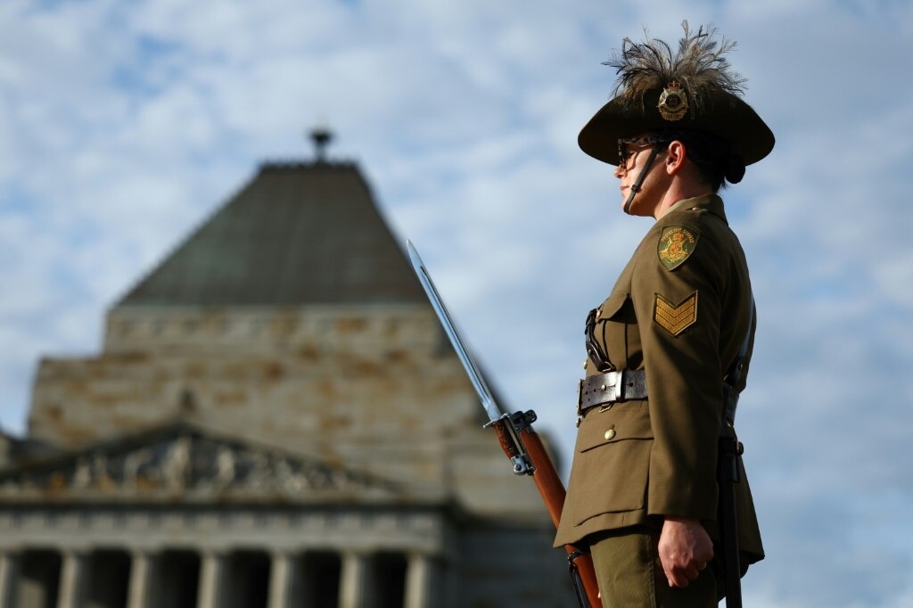 Crowds join Anzac Day services for Australia, New Zealand forces