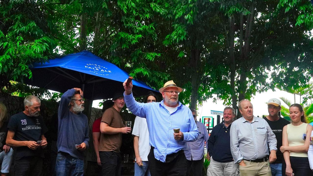 Australians flock to pubs to play two-up on Anzac Day