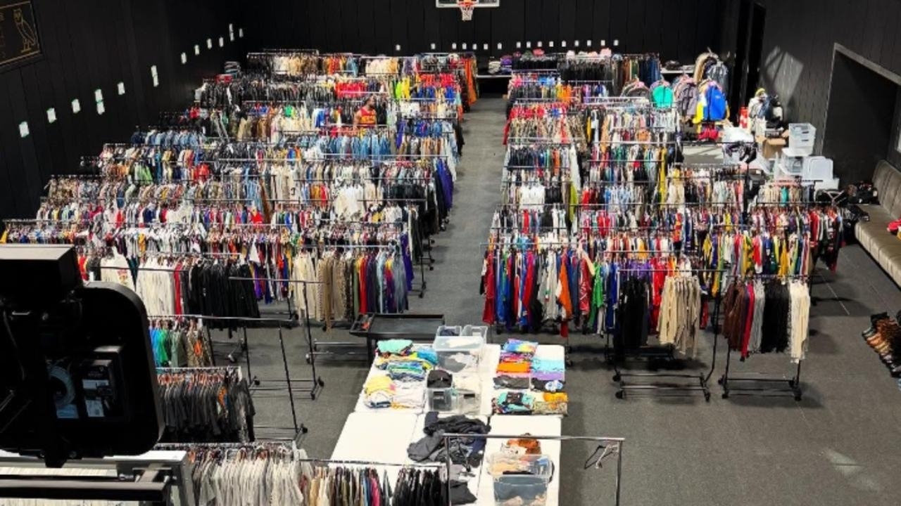Drake delivers rich flex by turning his basketball court into a T-shirt closet