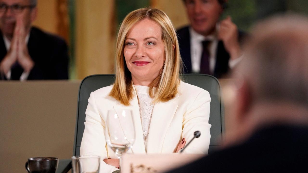 Giorgia Meloni caught giving ‘eye roll of the century' to Emmanuel Macron