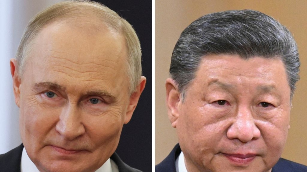 Vladimir Putin and Xi Jinping stand side-by-side and proclaim new world order