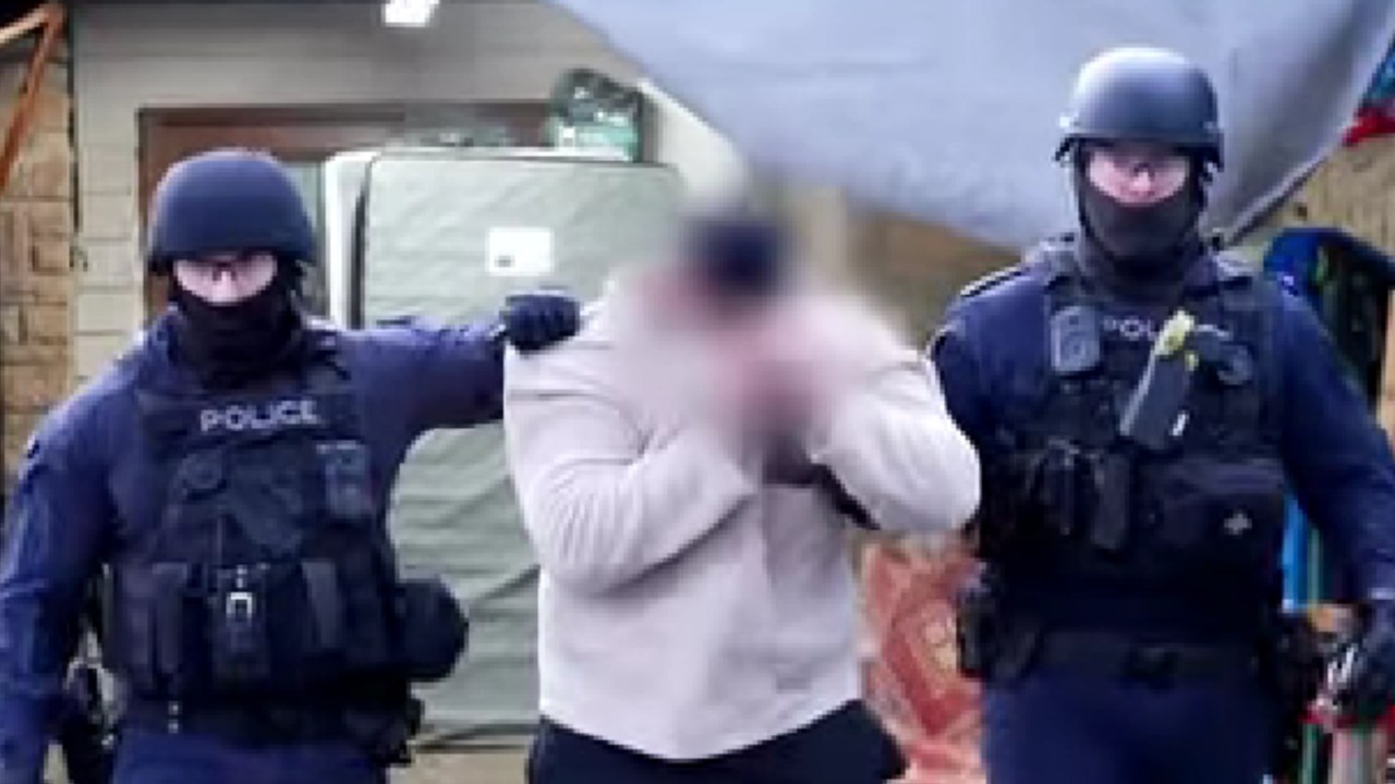 NSW Police charge two men after bullets were fired into a home and car in broad daylight in Auburn, Sydney's west