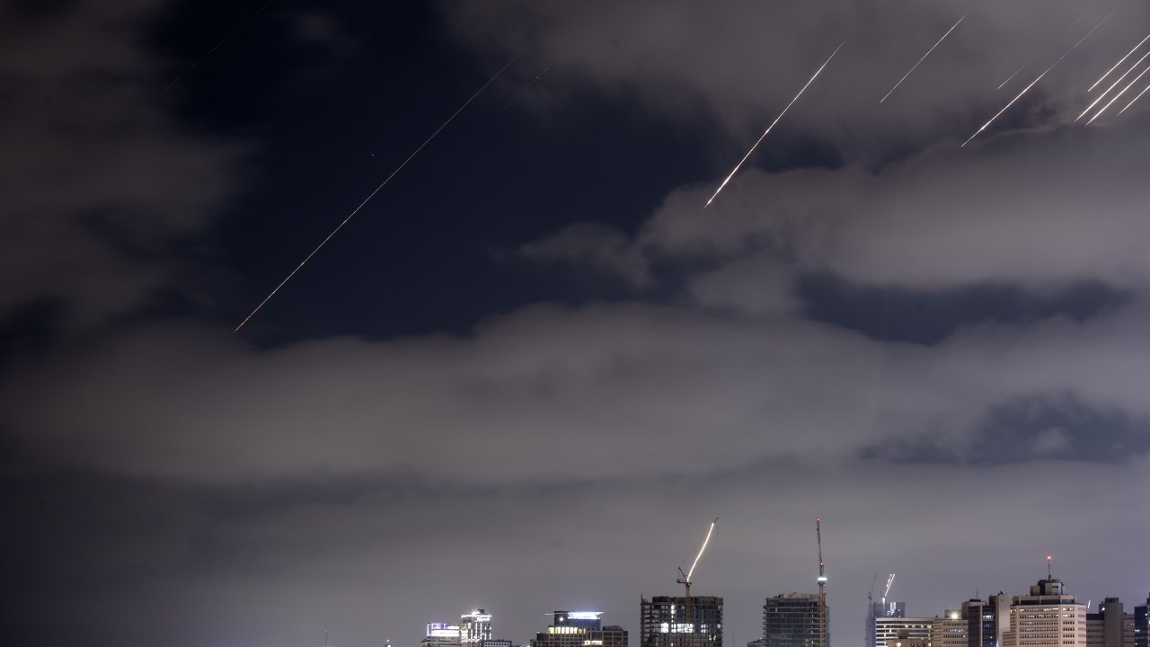 Iran and Israel trade fresh missile strikes amid rising tensions in Middle East, as Donald Trump calls for end to conflict
