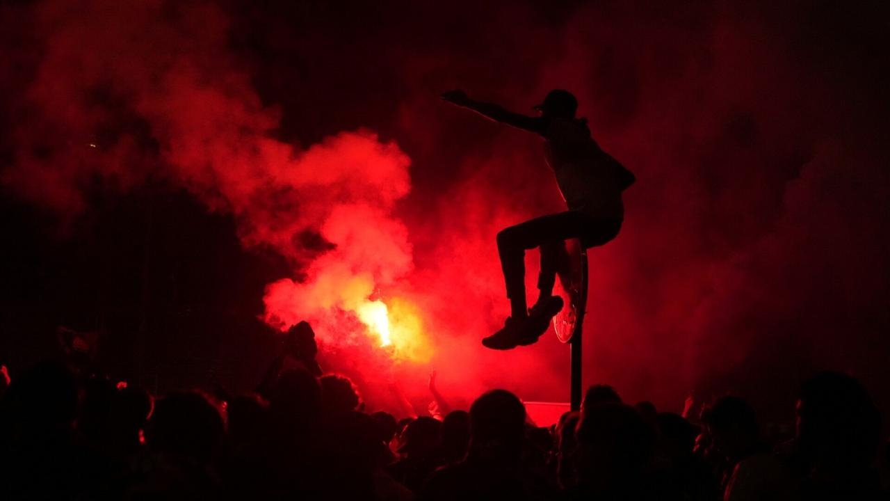 Hundreds arrested and two people killed in violent celebrations in France