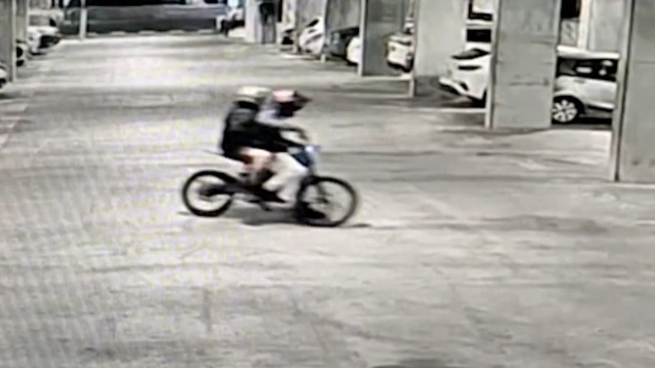 Police release footage in hunt for pair who sprayed baby with fire extinguisher