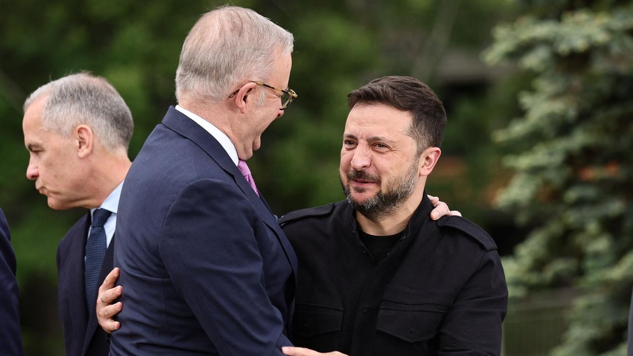 Anthony Albanese hugs Zelenskyy as G7 rallies round Ukraine