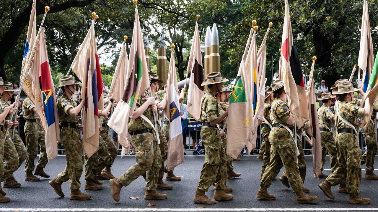 Queensland crowds brave rain for Anzac Day March