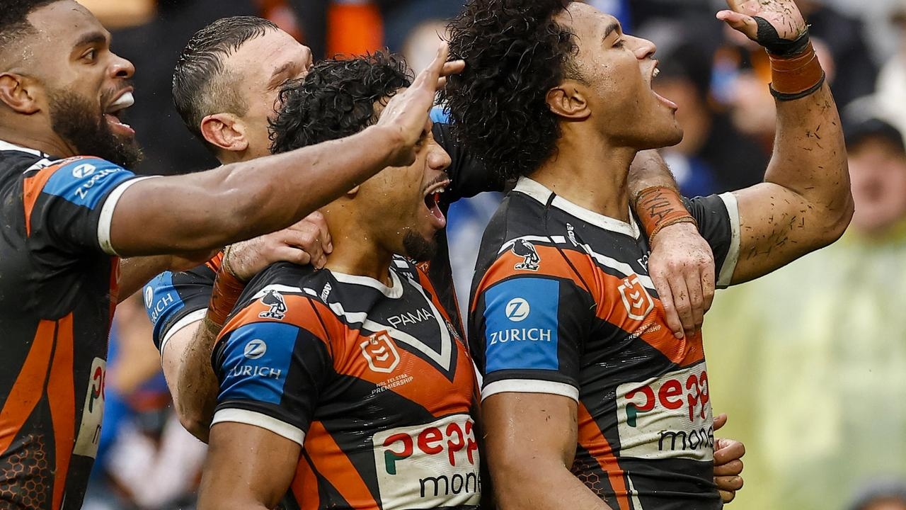 Wests Tigers officially warned and centre Brent Naden is set for a fine after for using an offensive middle eastern hand gesture