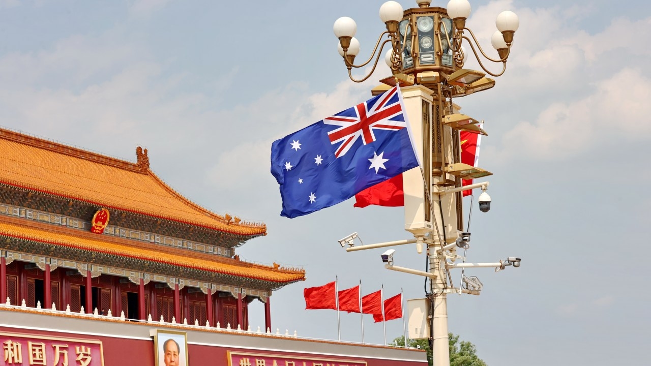 'We never interfere': China denies allegations of foreign interference after AFP charges Chinese national in Canberra over collecting information