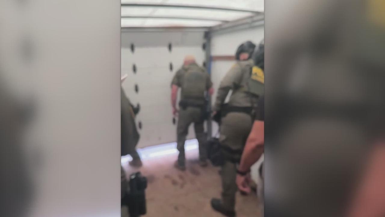 Border Patrol agents burst out of a truck and arrest up to 16 people at Home Depot raid