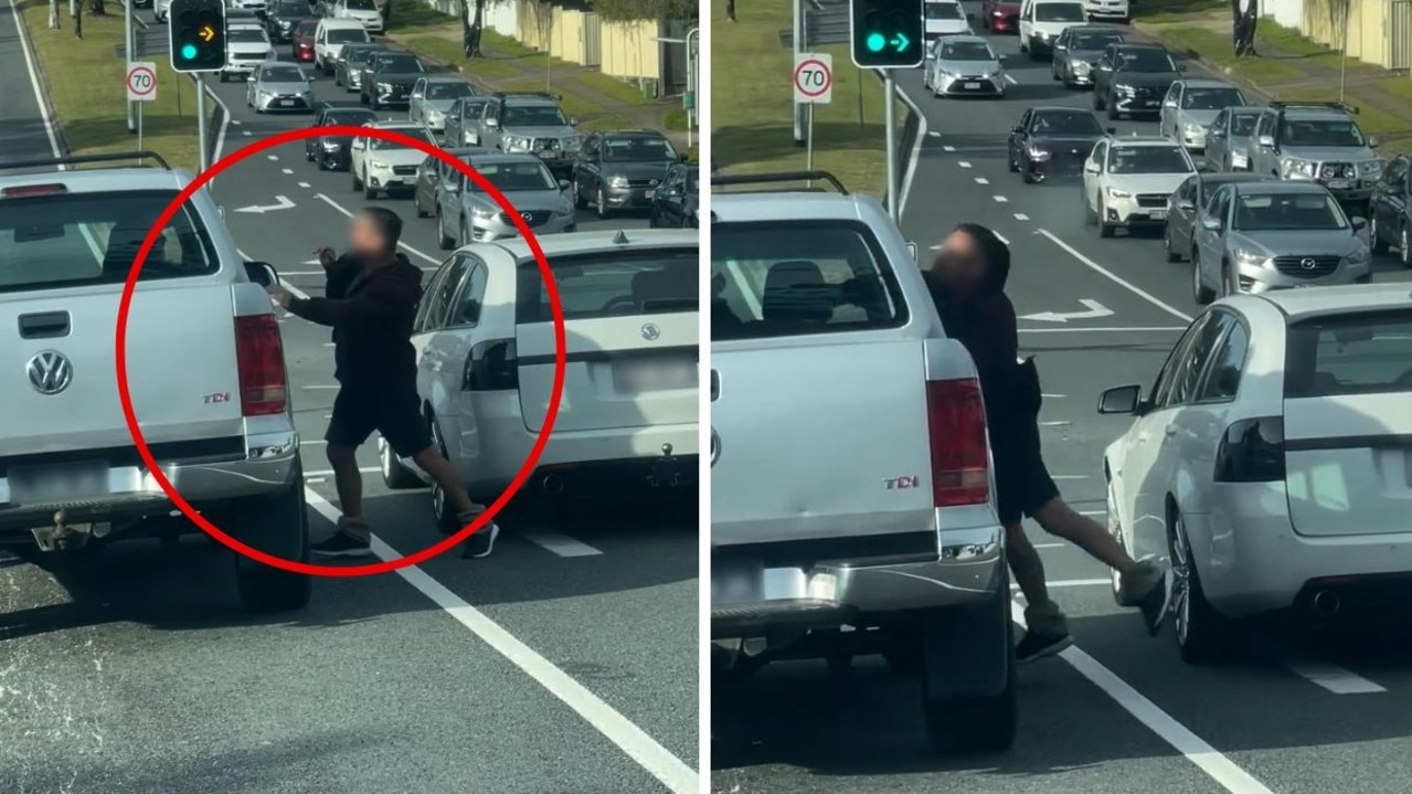 Brawling Aussie blokes halt traffic on busy road