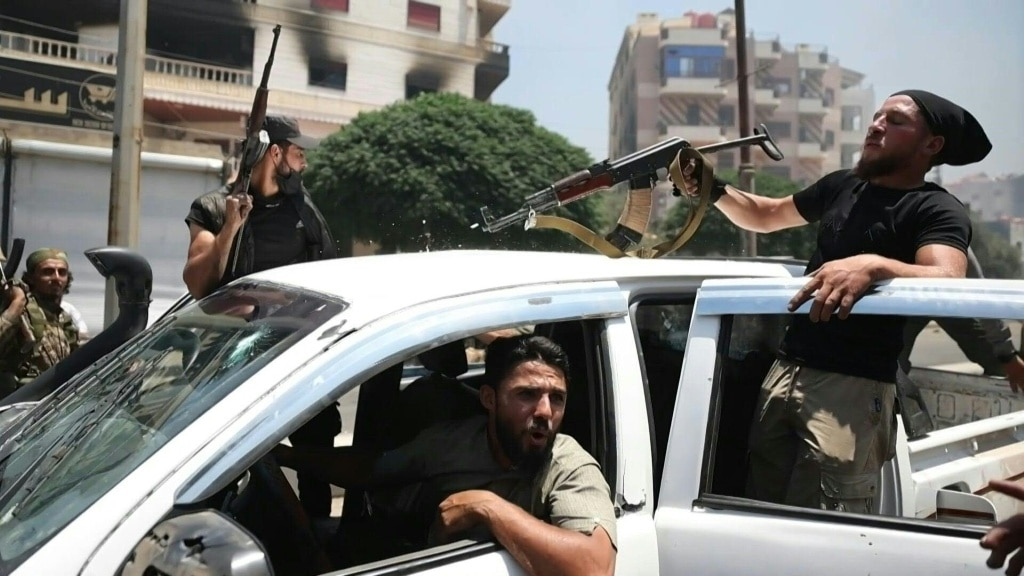 Clashes, homes torched in south Syria's Sweida despite ceasefire