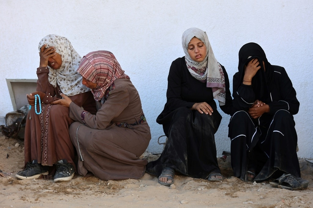 Spain PM alleges 'genocide' in Gaza as rescuers say 65 killed
