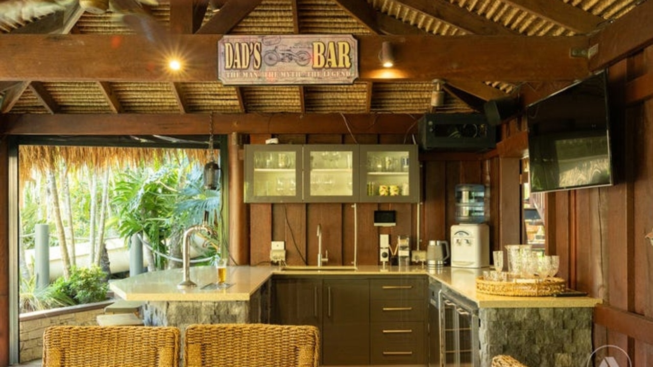 Qld acreage comes with insane ‘Dad's Bar' with beer on tap