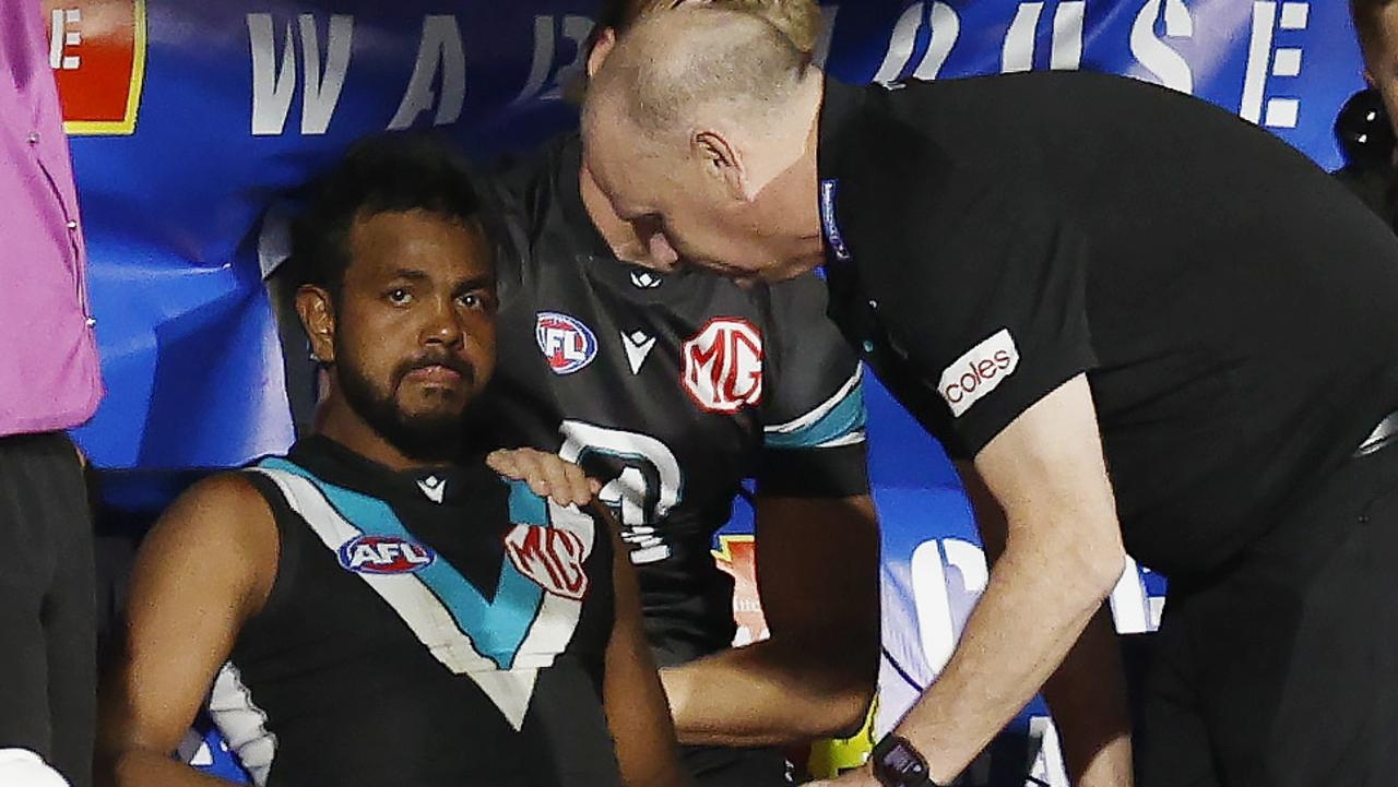 Essendon coach Brad Scott says his players didn't feel the need to take a comment from Port's Willie Rioli any further