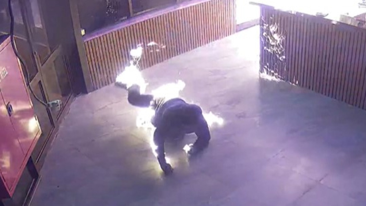 Shocking moment arsonist sets himself on fire during restaurant attack in new CCTV footage